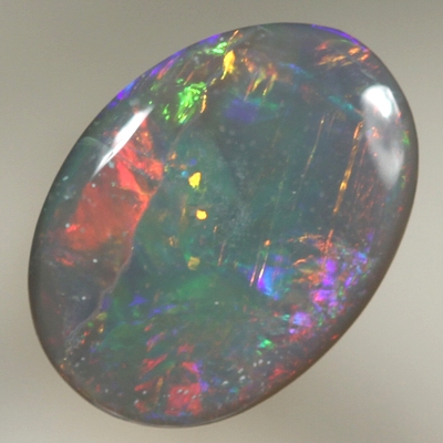SOLID BLACK OPAL Bright rolling flashes